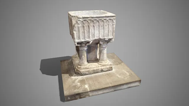 中世纪  哥特风格  石质洗礼盆  拱纹与柱形装饰  经典元素  雕花石柱  宗教仪式  