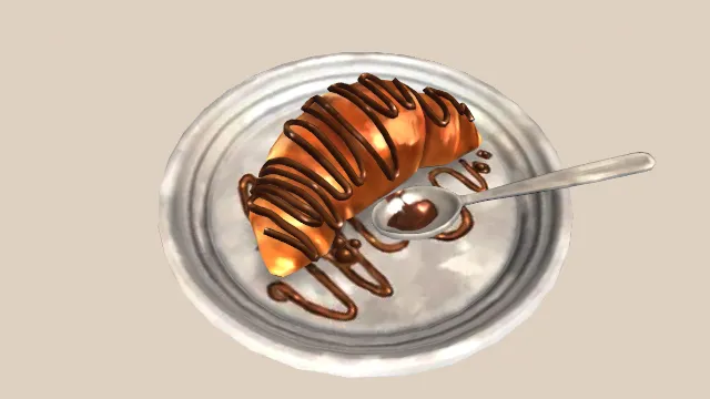 盘子装的羊角面包甜点巧克力酱食物