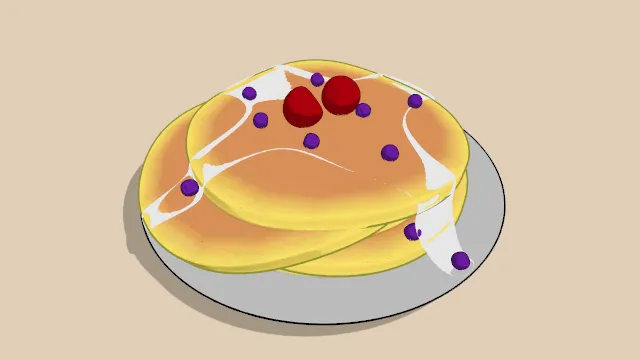 放在盘子里撒有糖浆的煎饼食物