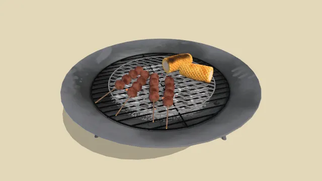 圆形烧烤架子烤有肉丸串玉米