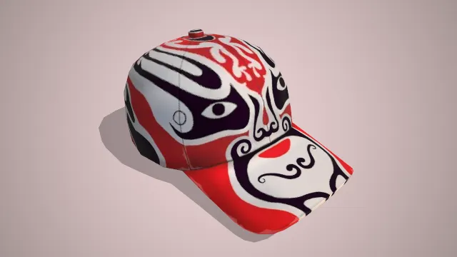 红色画有脸谱花样的帽子