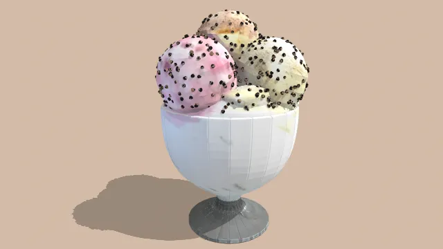 高脚杯装的冰淇淋球撒有巧克力碎食物