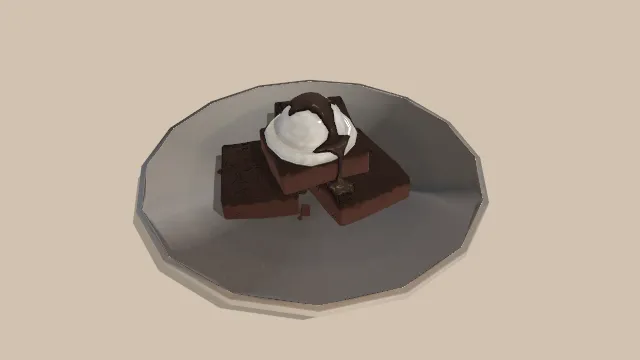 盘子装的布朗尼甜点放有冰淇淋球巧克力酱食物