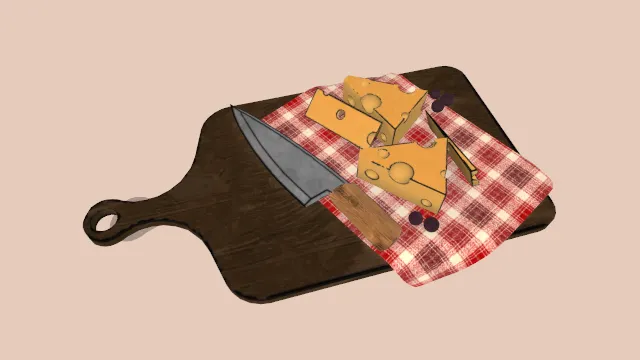 放在木菜板上的餐布刀奶酪板食物工具