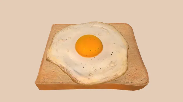 放在三明治上的煎蛋撒有小作料食物