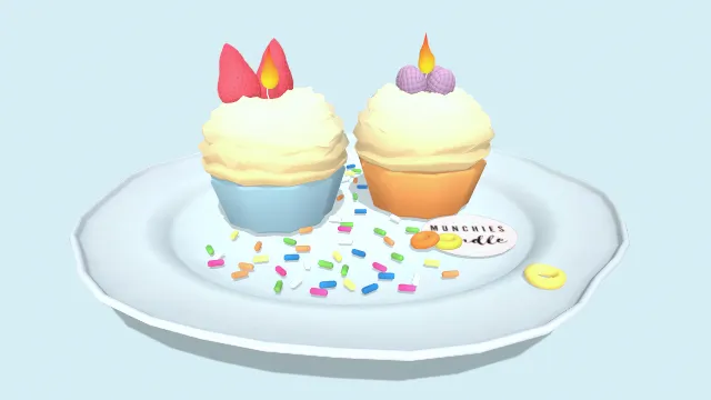 彩色纸杯蛋糕插有蜡烛草莓蓝莓水果糖果碎食物