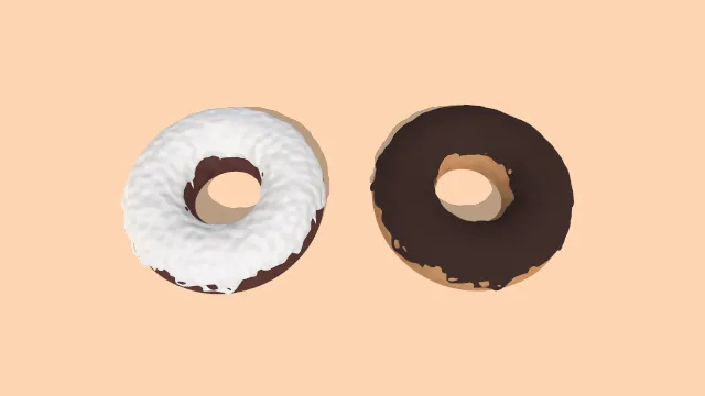 撒有巧克力酱甜甜圈甜点食物