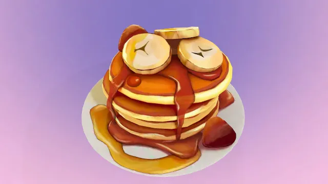 令人垂涎的香蕉煎饼配糖浆甜点食物