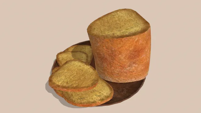 放在盘子里的被切过的面包和几片面包片食物