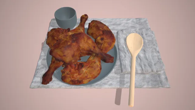 餐垫铺在一盘鸡腿下面有杯子勺子