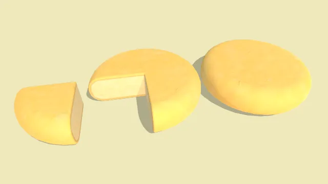 两块奶酪轮有一块被切开过食品