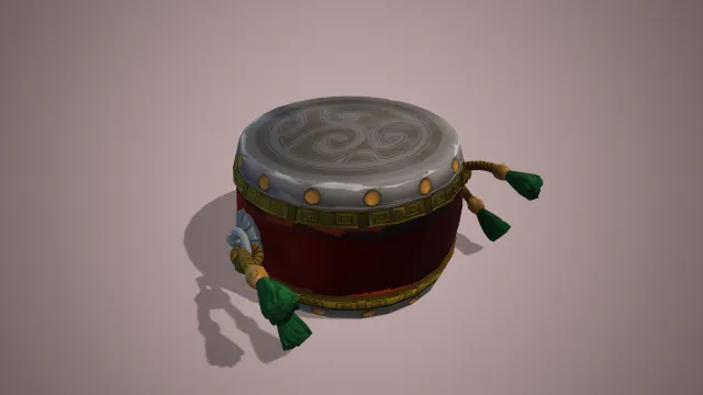 暗红色的鼓，两边有绿色的流苏装饰