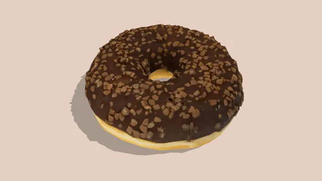 巧克力甜甜圈撒有坚果碎甜品